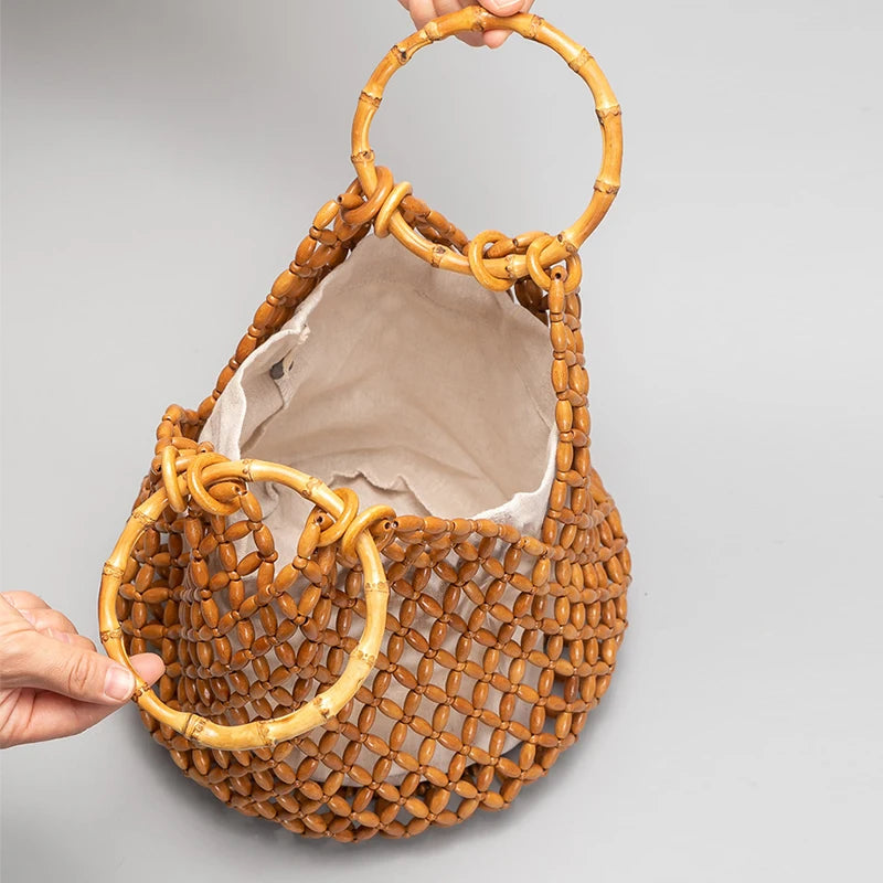The Resa Bamboo Handle Hollow Bucket Bag