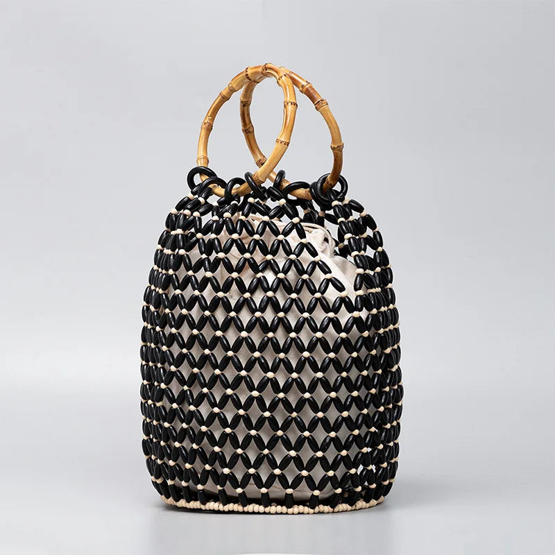 The Resa Bamboo Handle Hollow Bucket Bag