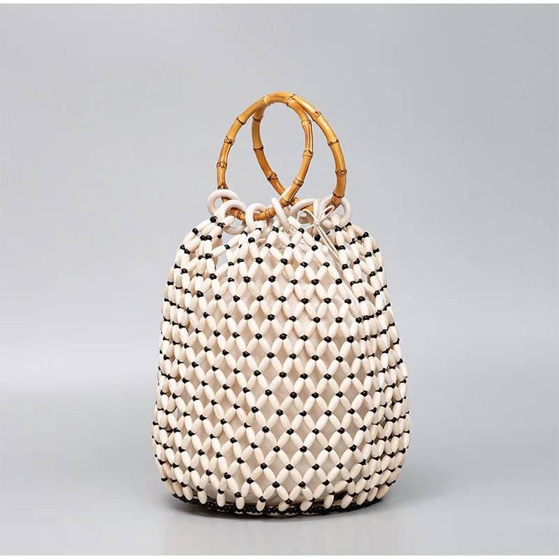 The Resa Bamboo Handle Hollow Bucket Bag