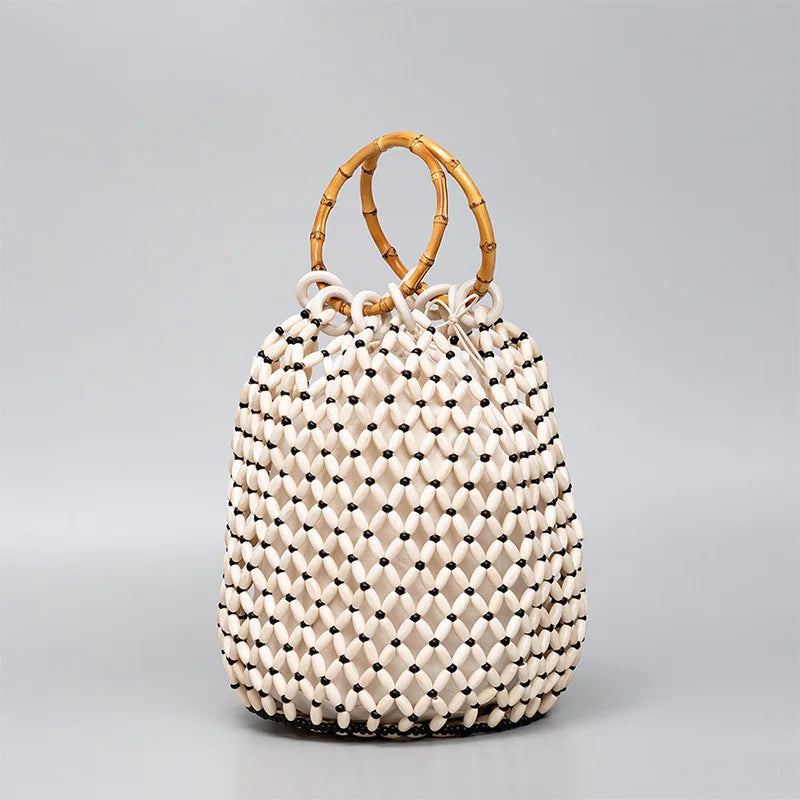 The Resa Bamboo Handle Hollow Bucket Bag
