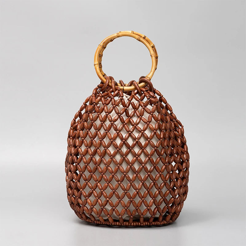 The Resa Bamboo Handle Hollow Bucket Bag