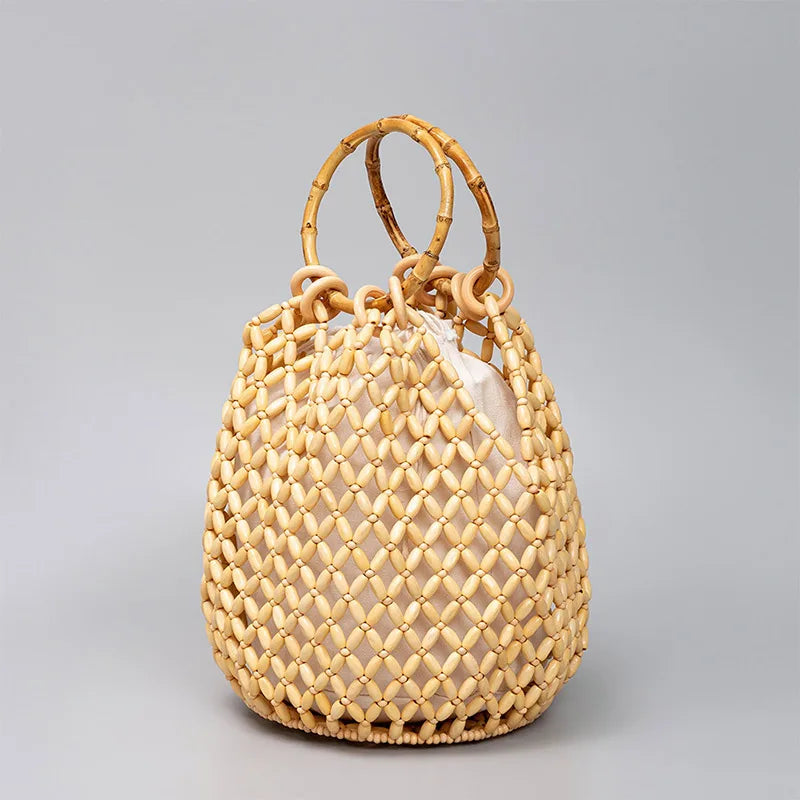 The Resa Bamboo Handle Hollow Bucket Bag